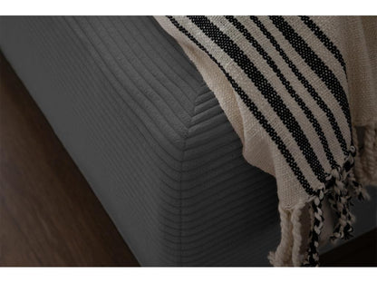 Letto in velluto grigio